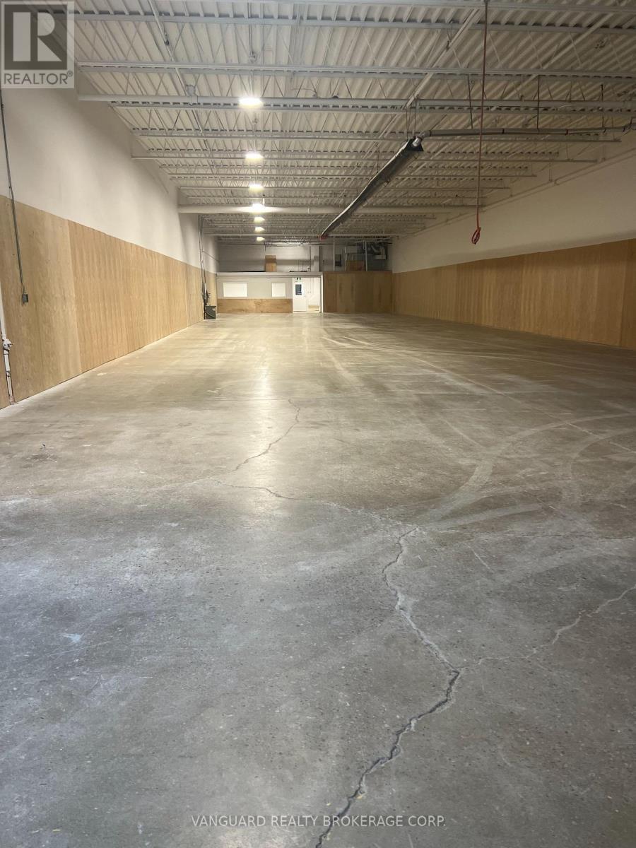 156 Milvan Drive, Toronto, Ontario  M9L 1Z9 - Photo 4 - W12973416