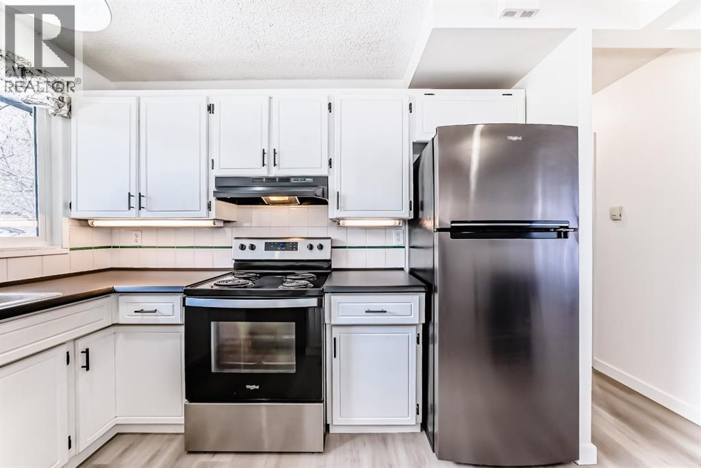 1277 Lake Sylvan Drive Se, Calgary, Alberta  T1J 3E2 - Photo 5 - A2299778