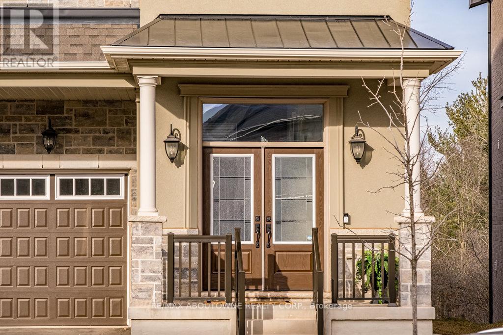 1456 Ford Strathy Crescent, Oakville, Ontario  L6H 3W9 - Photo 4 - W12975570