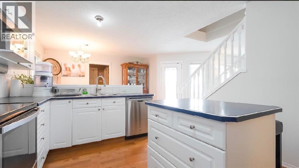 188 Tuscany Valley Drive Nw, Calgary, Alberta  T3L 2C2 - Photo 5 - A2294247