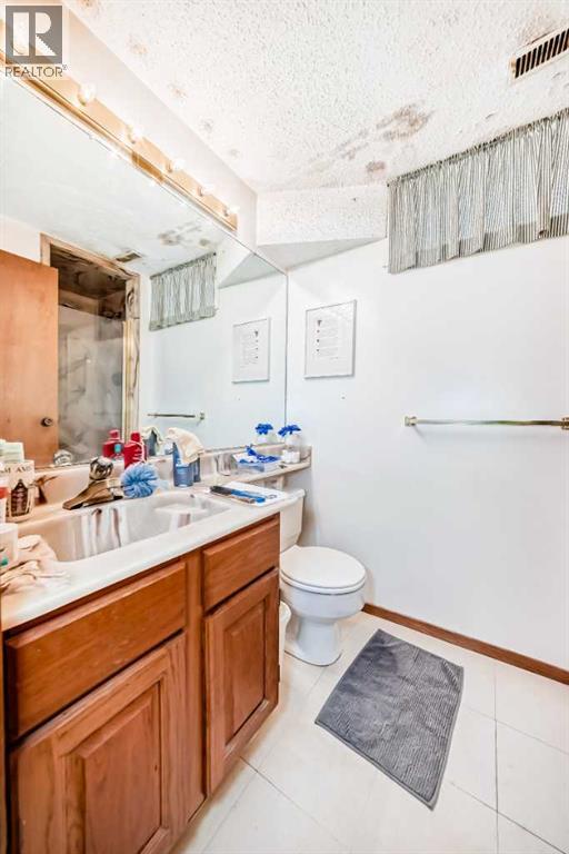 844 Lake Ontario Drive Se, Calgary, Alberta  T2J 3K1 - Photo 38 - A2286791