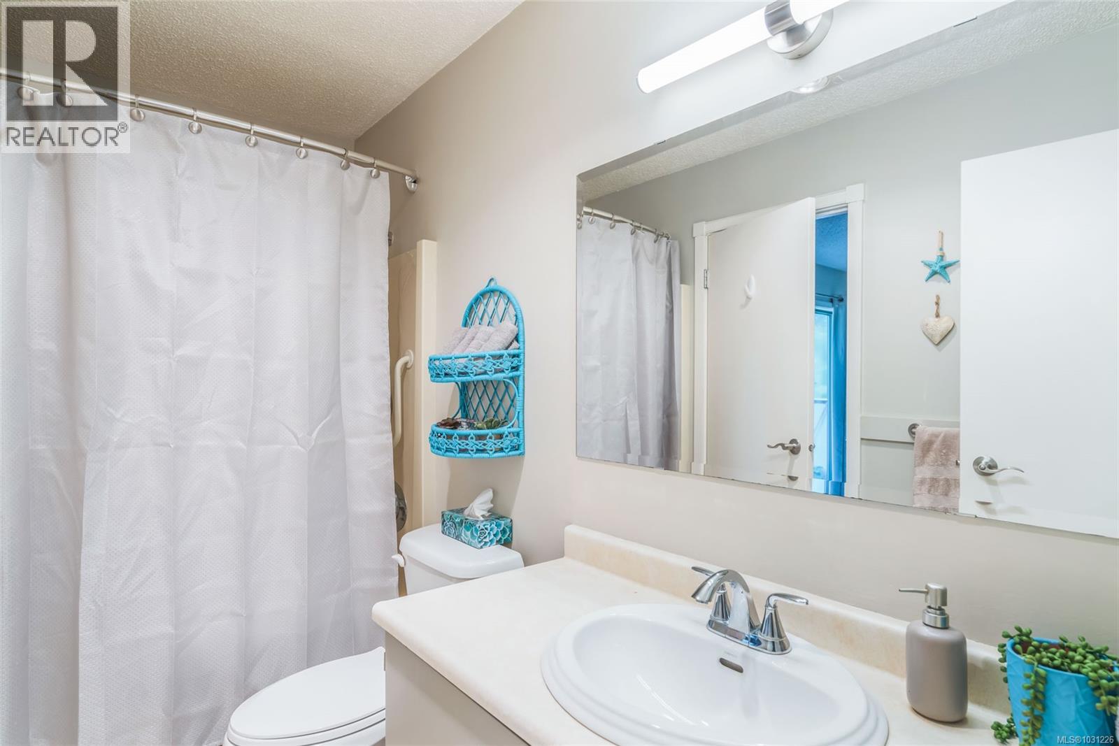 201 309 Morison Ave, Parksville, British Columbia  V9P 1M6 - Photo 9 - 1031226