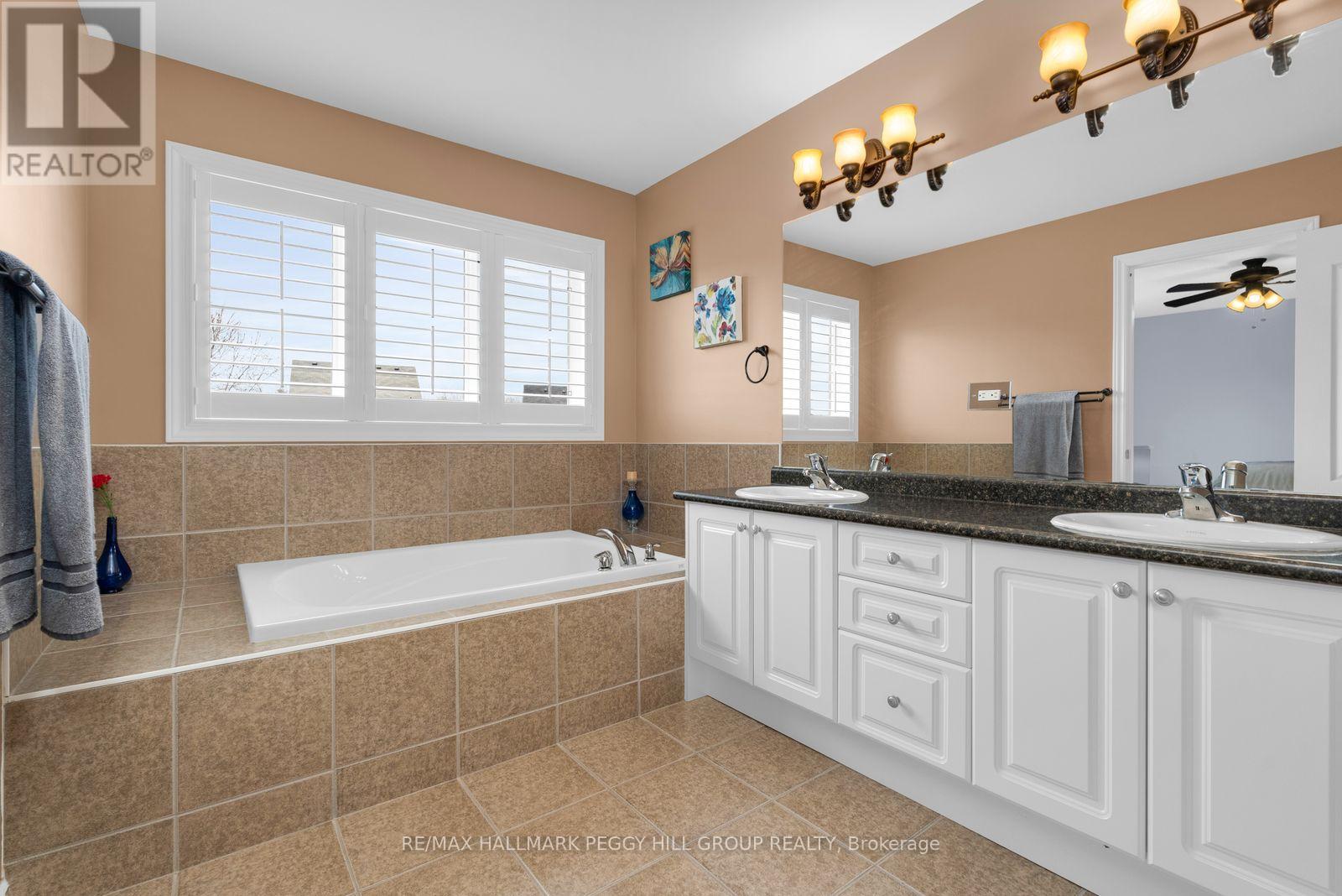 298 Greenwood Drive, Essa, Ontario  L3W 0E8 - Photo 9 - N12975906