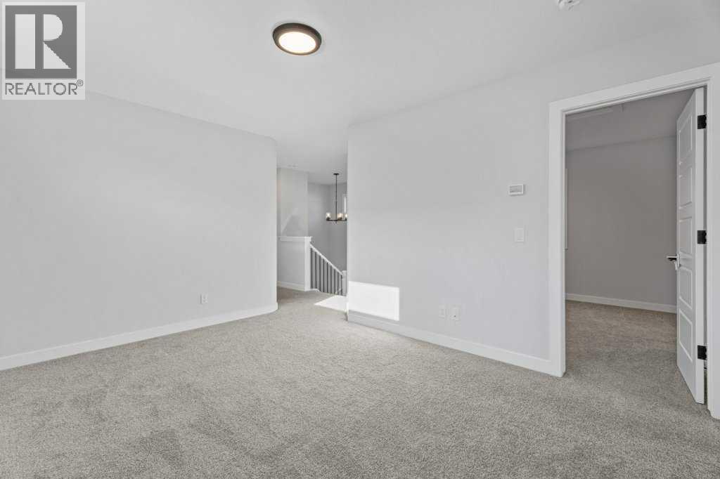 71 Ranchers View, Okotoks, Alberta  T1S 5R6 - Photo 34 - A2285159