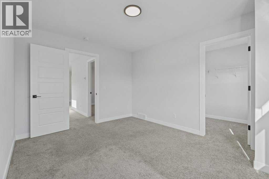 71 Ranchers View, Okotoks, Alberta  T1S 5R6 - Photo 40 - A2285159