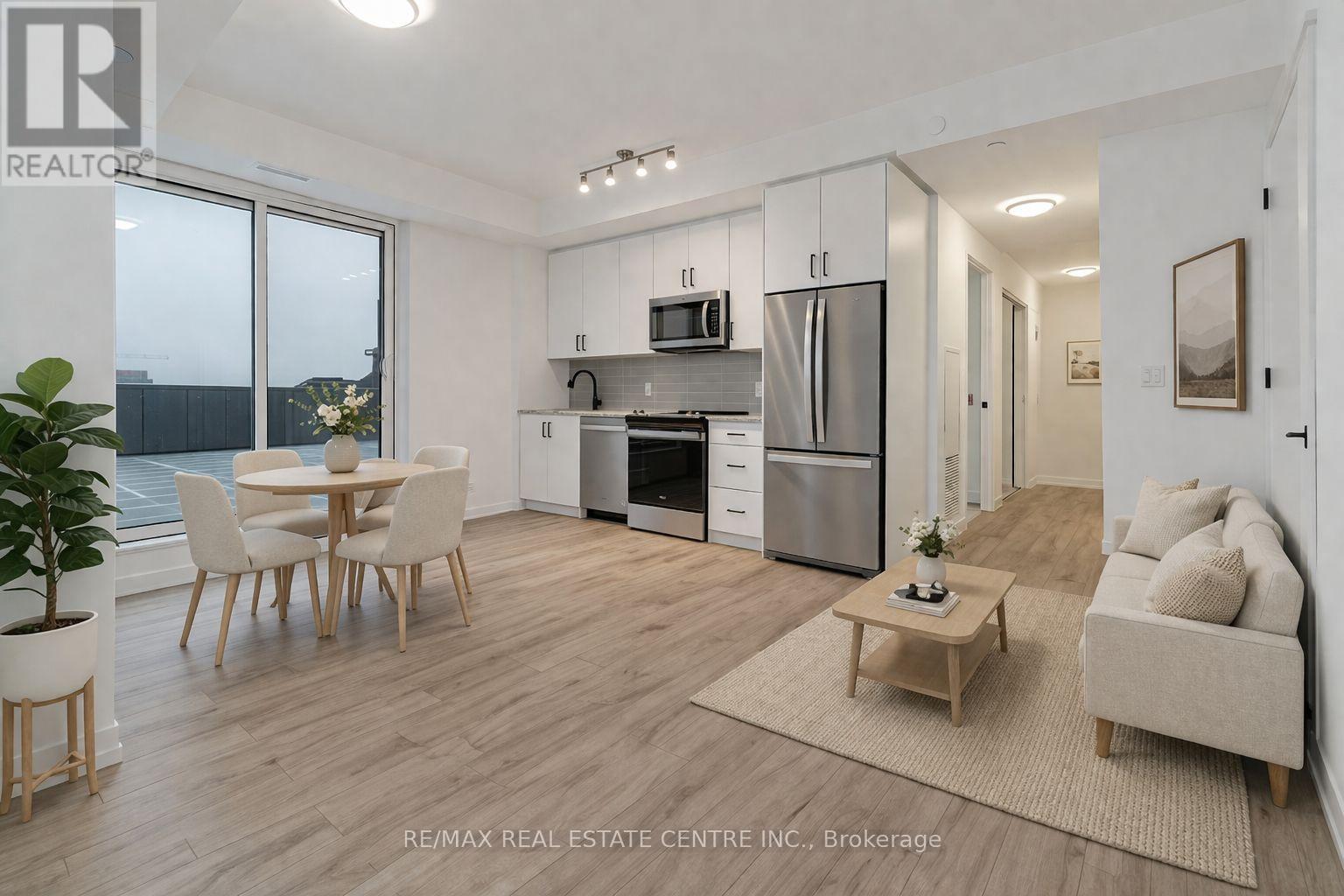 907 - 345 Wheat Boom Drive, Oakville, Ontario  L6H 7X4 - Photo 2 - W12976190