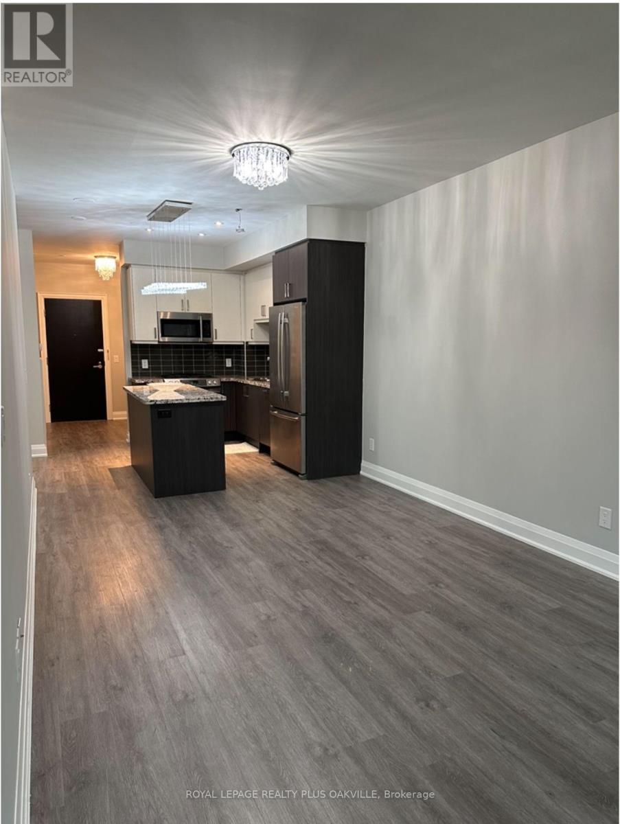 202 - 11 Bronte Road, Oakville, Ontario  L6L 0E1 - Photo 5 - W12976396