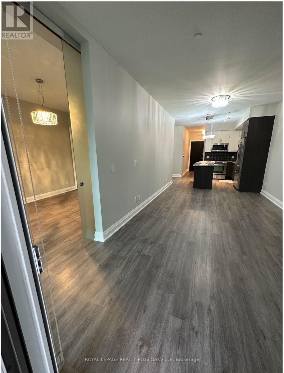 202 - 11 Bronte Road, Oakville, Ontario  L6L 0E1 - Photo 6 - W12976396