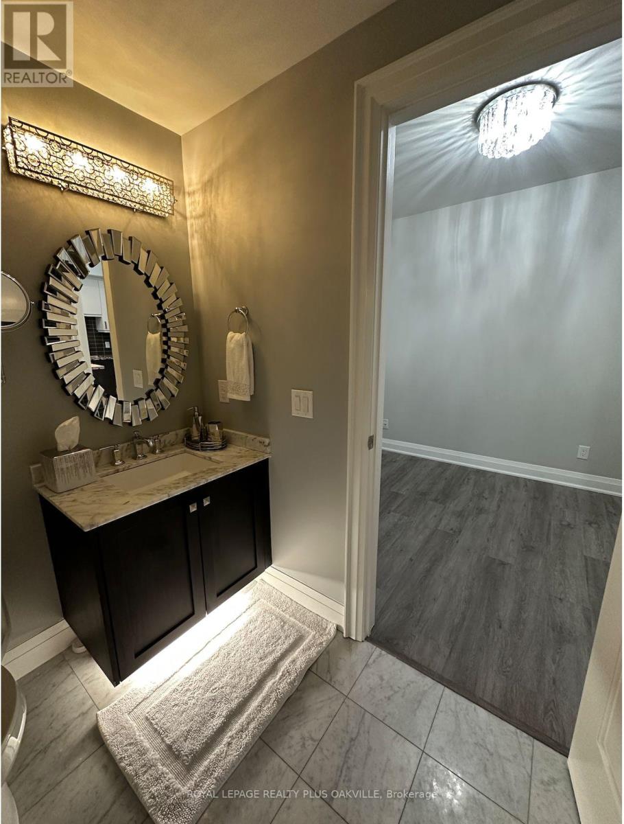 202 - 11 Bronte Road, Oakville, Ontario  L6L 0E1 - Photo 8 - W12976396