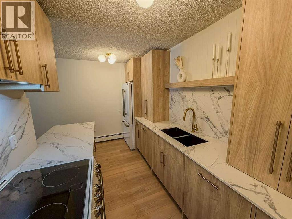 2106, 4001b 49 Street NW, Calgary, Alberta  T3A 2C9 - Photo 4 - A2299807