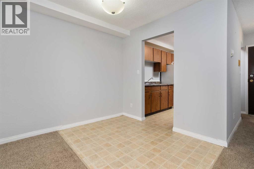 102, 5418 52 Street, Camrose, Alberta  T4V 4A6 - Photo 5 - A2299923