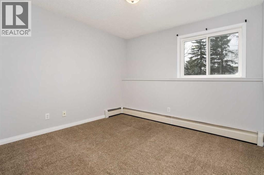 102, 5418 52 Street, Camrose, Alberta  T4V 4A6 - Photo 9 - A2299923