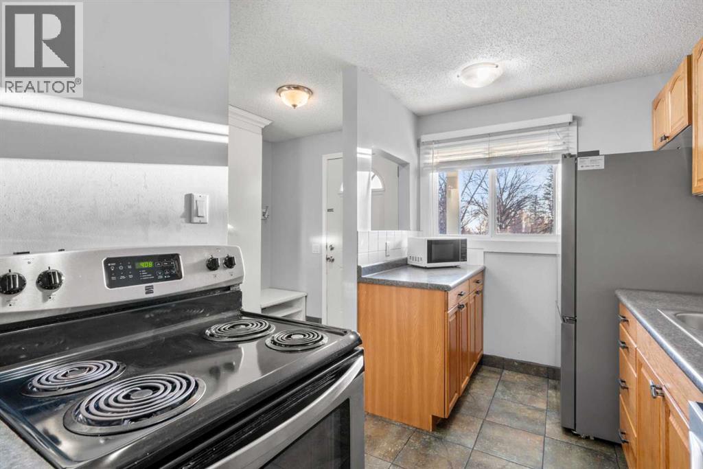 15, 200 Shawnessy Drive Sw, Calgary, Alberta  T2Y 1G8 - Photo 7 - A2282525