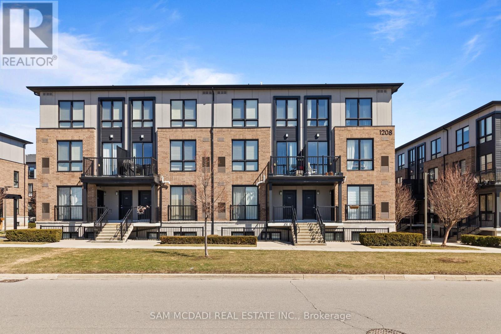 201 - 1208 Main Street E, Milton, Ontario  L9T 9K7 - Photo 1 - W12977418