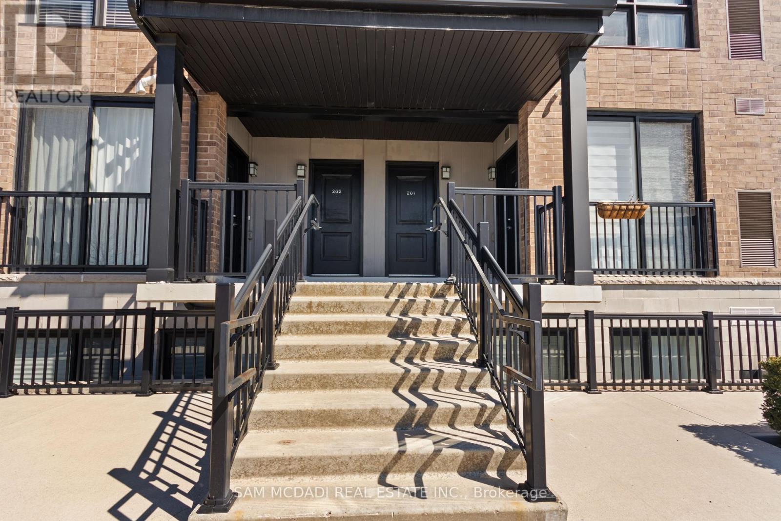 201 - 1208 Main Street E, Milton, Ontario  L9T 9K7 - Photo 3 - W12977418