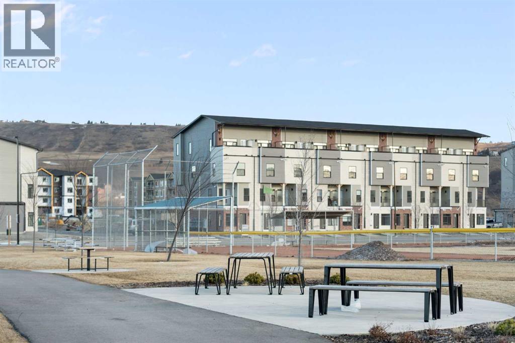 208, 156 Park Street, Cochrane, Alberta T4C 2B8 - Photo 39 - A2291443