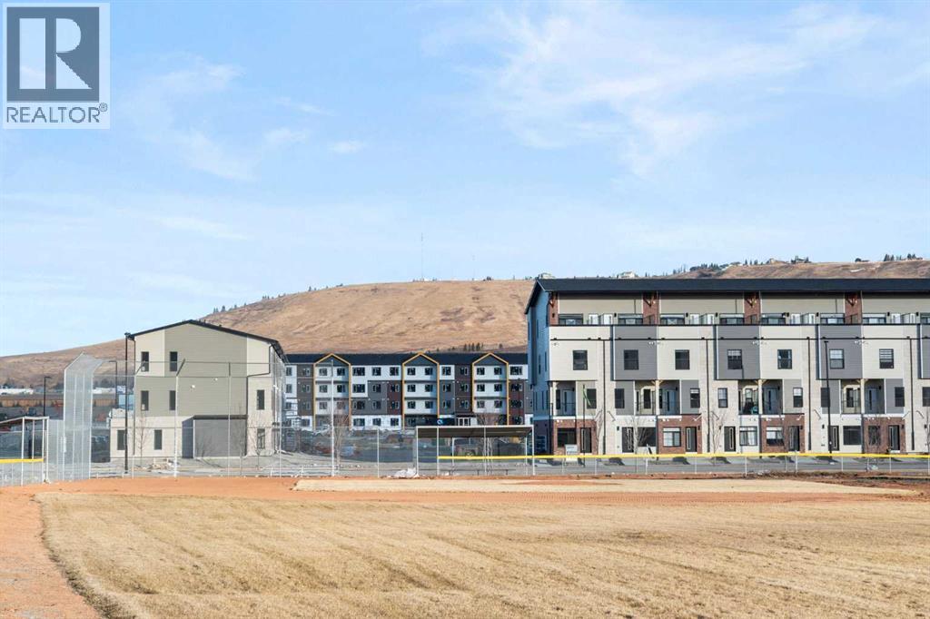 208, 156 Park Street, Cochrane, Alberta T4C 2B8 - Photo 41 - A2291443