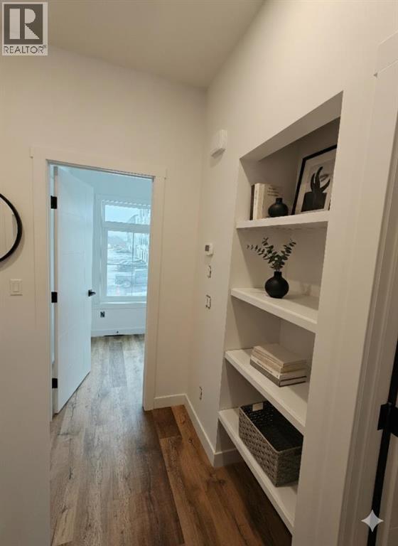 208, 156 Park Street, Cochrane, Alberta T4C 2B8 - Photo 49 - A2291443