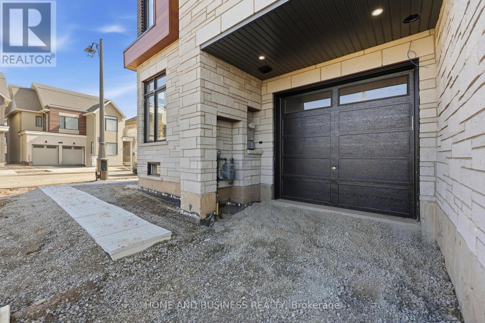 75 Jack Bowerbank Boulevard, Oakville, Ontario  L6M 4K1 - Photo 4 - W12977822