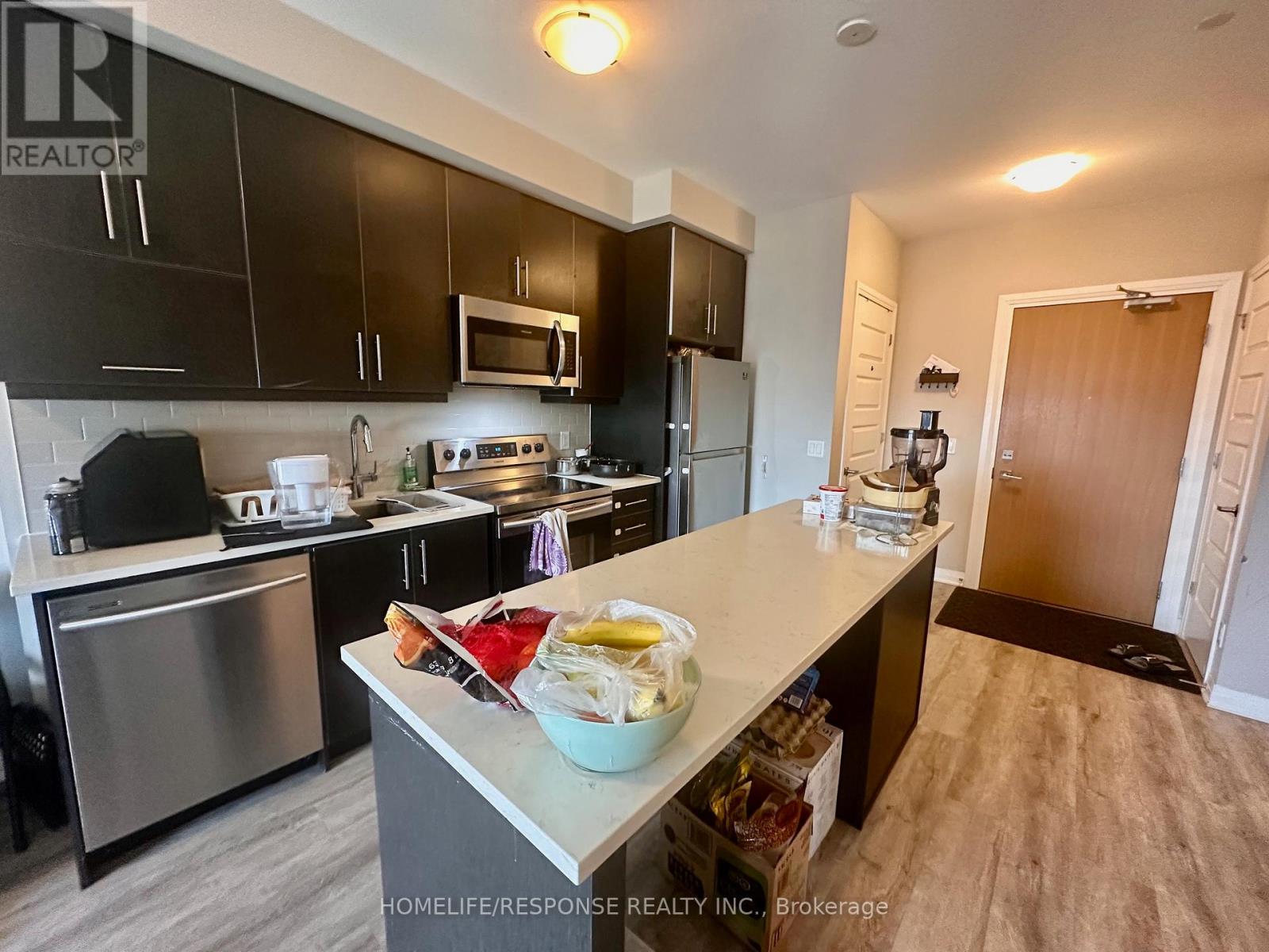 508 - 128 Grovewood Common, Oakville, Ontario  L6H 0X3 - Photo 7 - W12977840