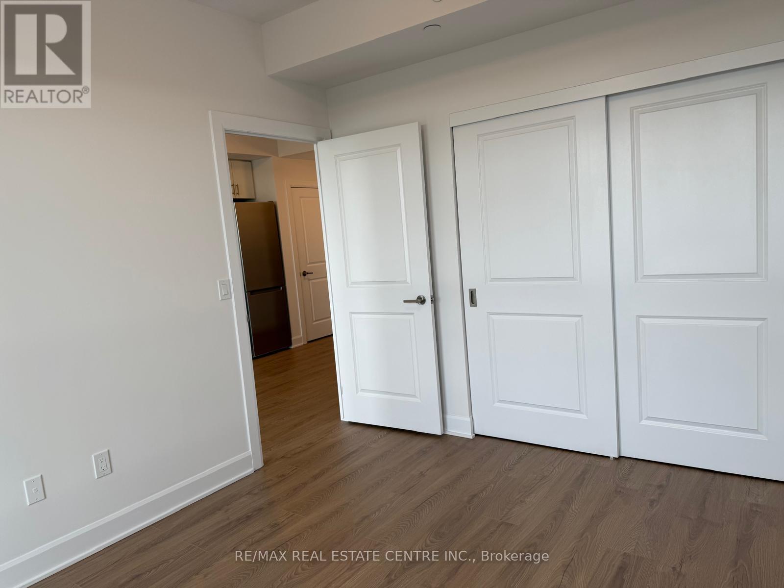 1106 - 3240 William Coltson Avenue, Oakville, Ontario  L6H 8C8 - Photo 4 - W12978218