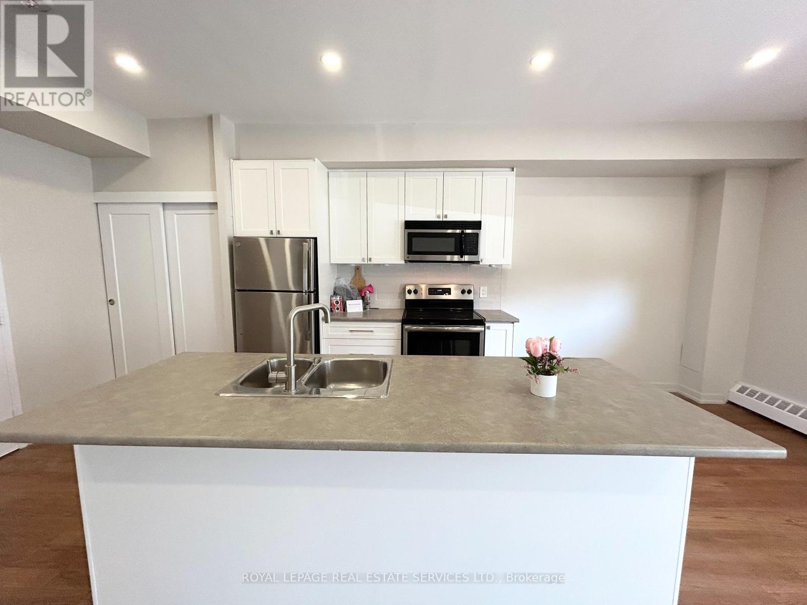 102 - 62 Park Avenue, Halton Hills, Ontario  L7G 4Z1 - Photo 6 - W12978220