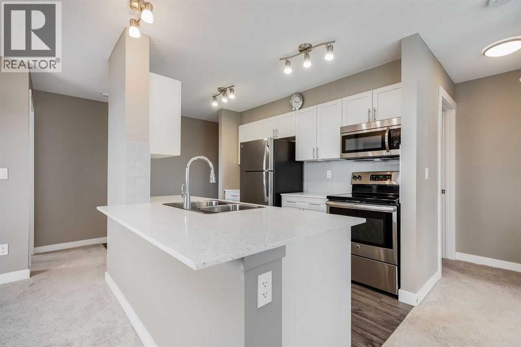 402, 20 Kincora Glen Park Nw, Calgary, Alberta  T3R 1R9 - Photo 3 - A2294627