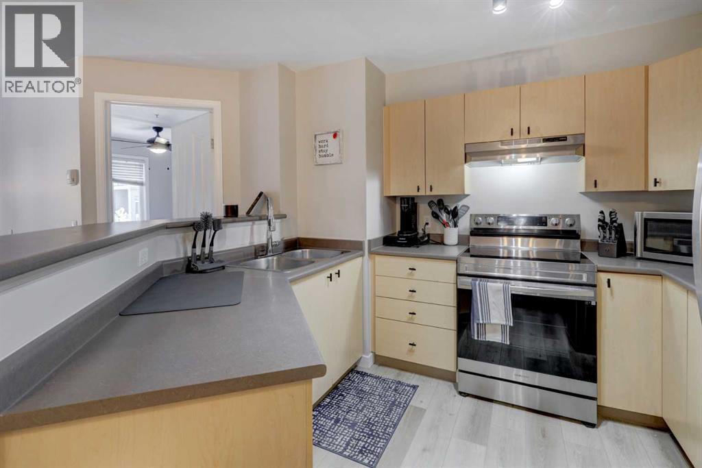 8323, 304 Mackenzie Way Sw, Airdrie, Alberta  T4B 3H8 - Photo 6 - A2300460