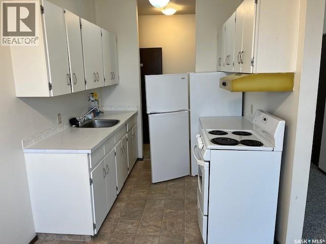 302 8th Avenue Sw, Biggar, Saskatchewan  S0K 0M0 - Photo 5 - SK032500