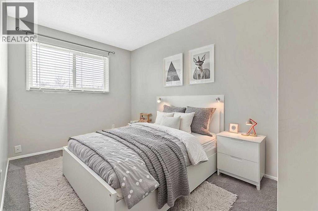 129 Berwick Drive Nw, Calgary, Alberta T3K 1E7 - Photo 16 - A2293000