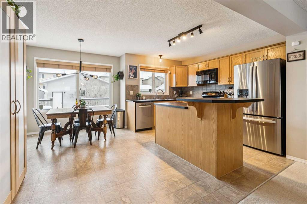 117 Reunion Court Nw, Airdrie, Alberta  T4B 0G9 - Photo 2 - A2292703