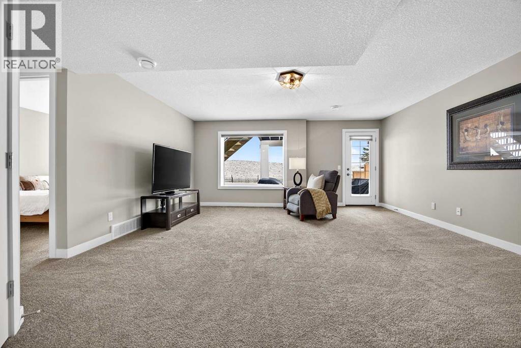 144 Sundown View, Cochrane, Alberta  T4C 2N9 - Photo 38 - A2286035