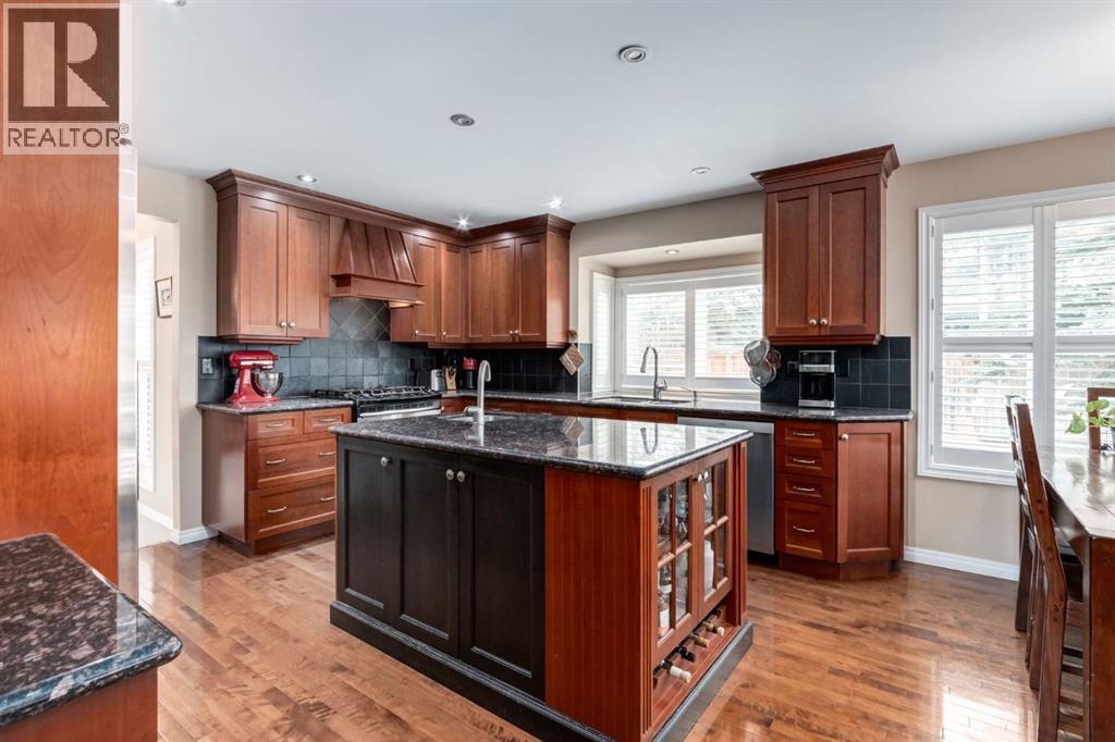 51 Woodacres Crescent SW, Calgary, Alberta  T2W 4V5 - Photo 9 - A2298947