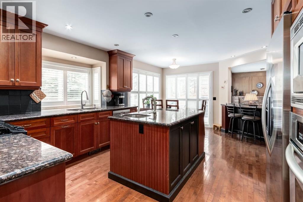 51 Woodacres Crescent SW, Calgary, Alberta  T2W 4V5 - Photo 8 - A2298947