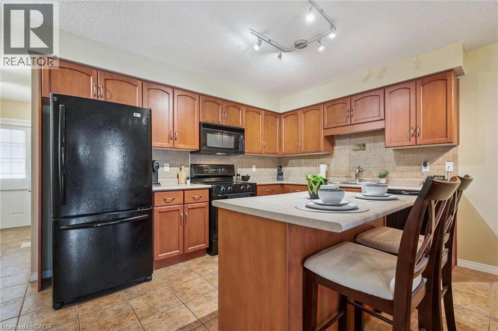 210 Dawn Avenue Unit# 38, Guelph, Ontario  N1G 5L5 - Photo 3 - 40818396