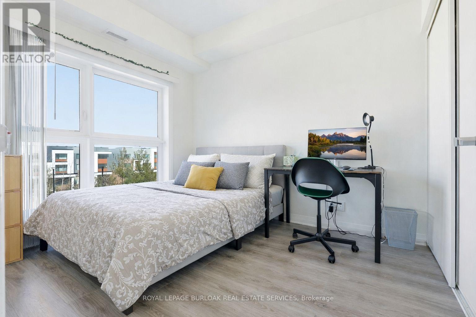 304 - 128 Grovewood Common, Oakville, Ontario  L6H 0X3 - Photo 11 - W12979118