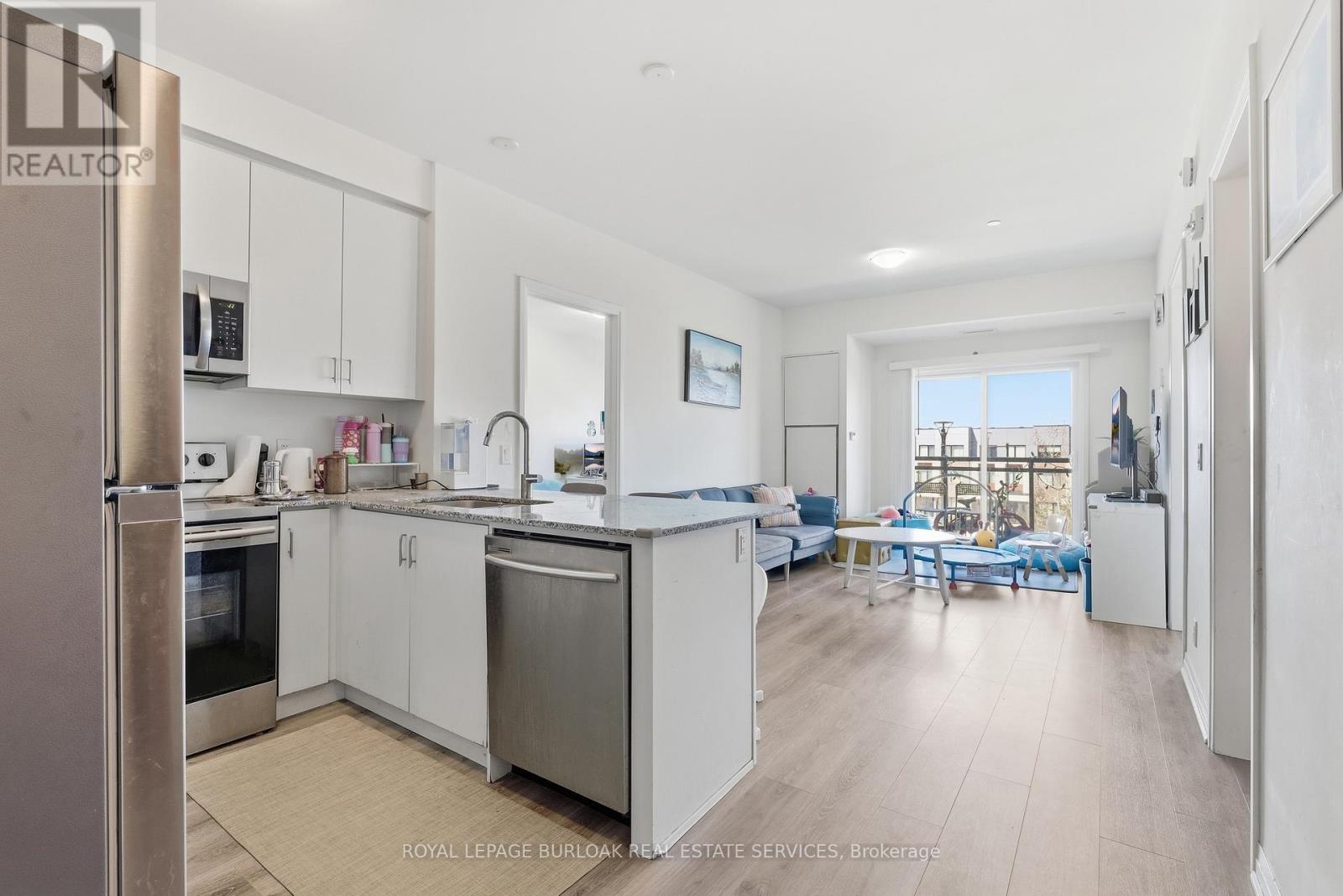 304 - 128 Grovewood Common, Oakville, Ontario  L6H 0X3 - Photo 4 - W12979118