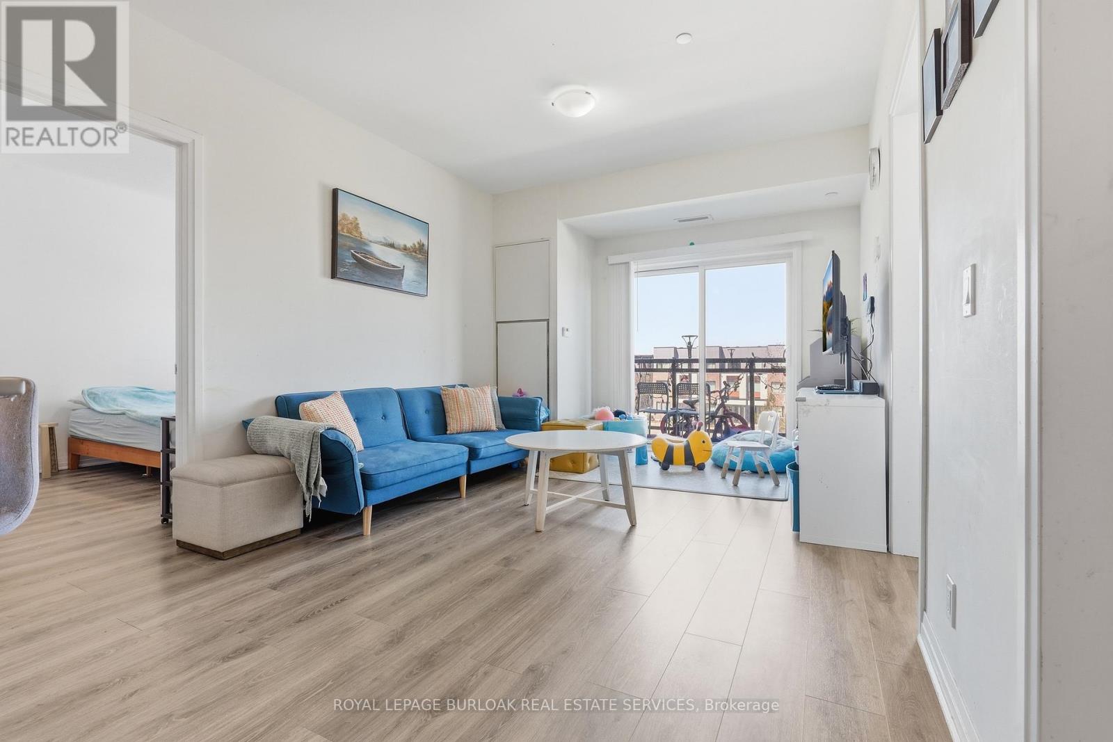 304 - 128 Grovewood Common, Oakville, Ontario  L6H 0X3 - Photo 5 - W12979118