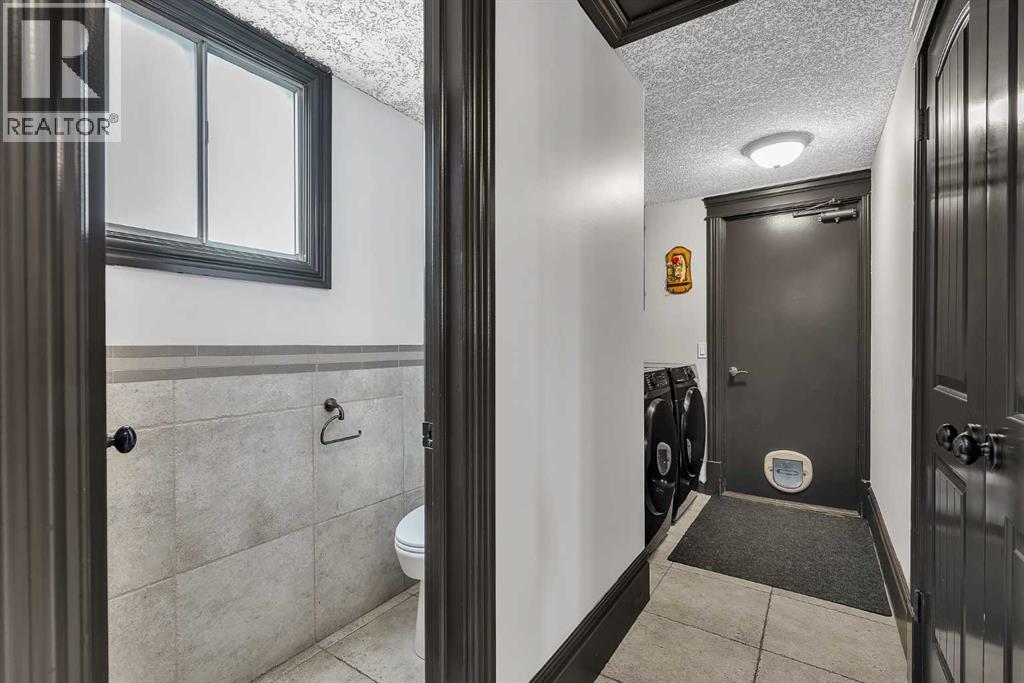 511 Woodpark Crescent SW, Calgary, Alberta  T2W 2S1 - Photo 19 - A2299796