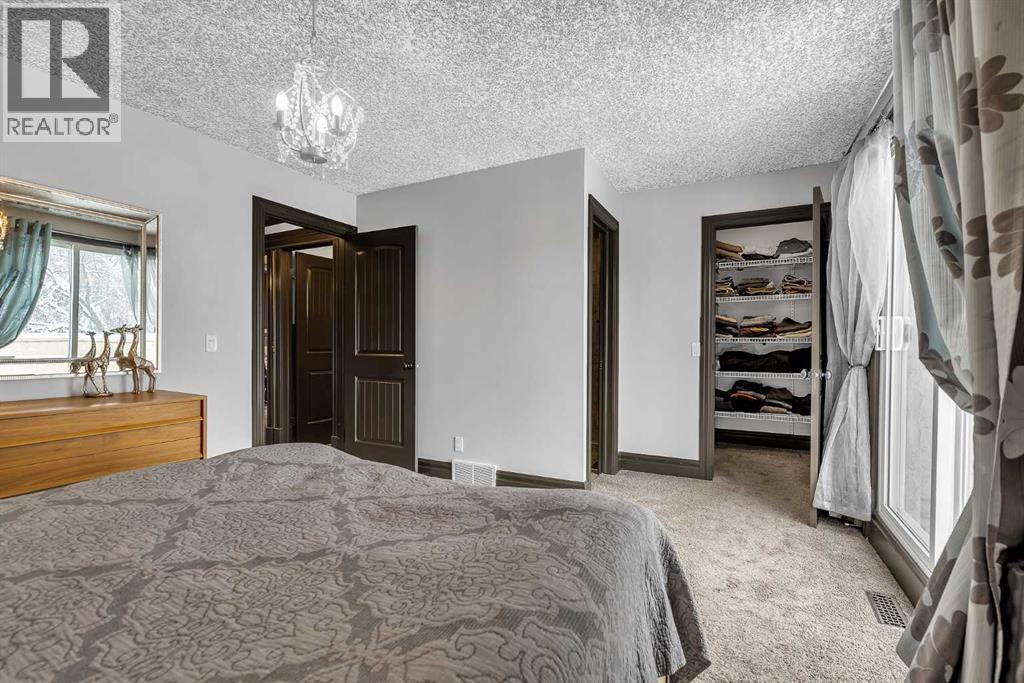 511 Woodpark Crescent SW, Calgary, Alberta  T2W 2S1 - Photo 24 - A2299796