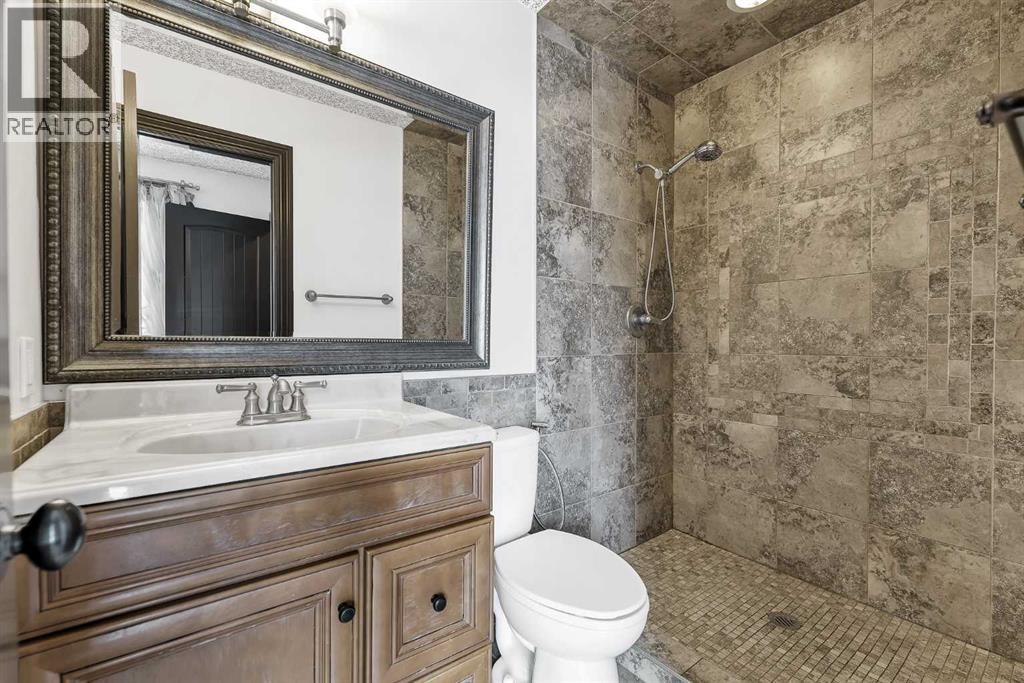 511 Woodpark Crescent SW, Calgary, Alberta  T2W 2S1 - Photo 26 - A2299796