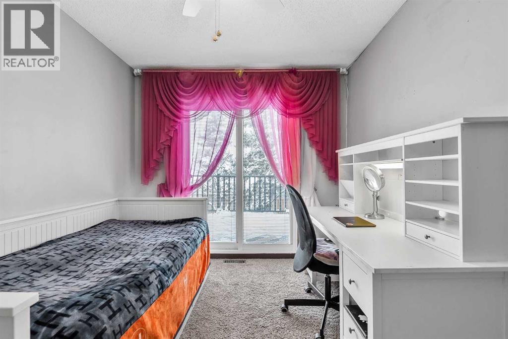 511 Woodpark Crescent SW, Calgary, Alberta  T2W 2S1 - Photo 28 - A2299796