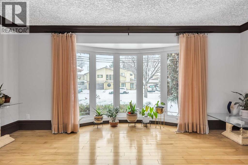 511 Woodpark Crescent SW, Calgary, Alberta  T2W 2S1 - Photo 7 - A2299796