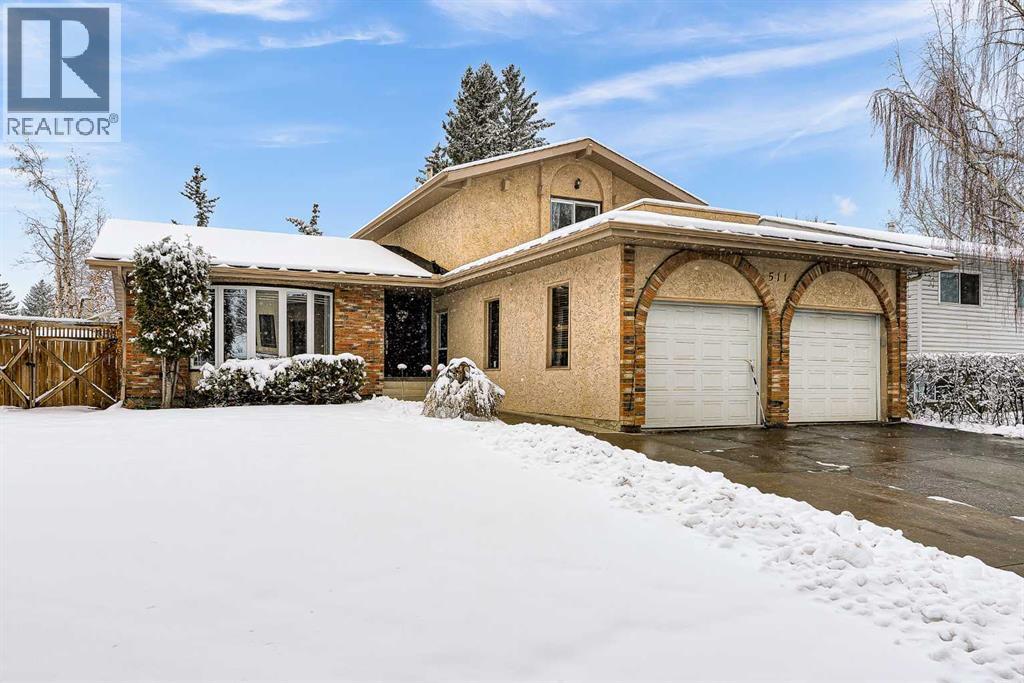 511 Woodpark Crescent SW, Calgary, Alberta  T2W 2S1 - Photo 2 - A2299796