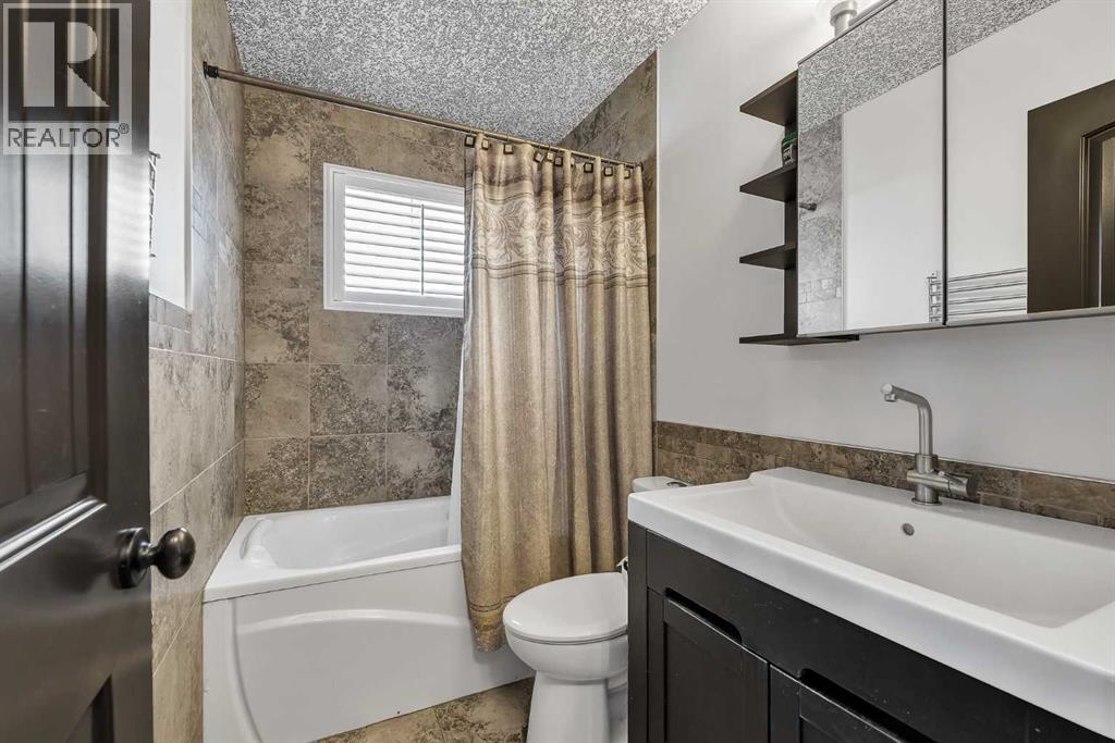 511 Woodpark Crescent SW, Calgary, Alberta  T2W 2S1 - Photo 32 - A2299796