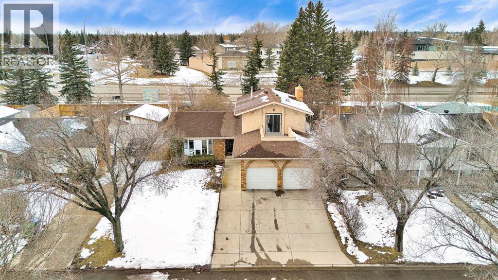 511 Woodpark Crescent SW, Calgary, Alberta  T2W 2S1 - Photo 44 - A2299796