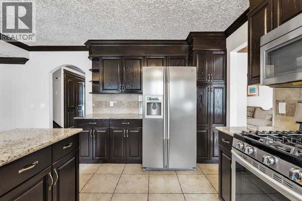 511 Woodpark Crescent SW, Calgary, Alberta  T2W 2S1 - Photo 16 - A2299796