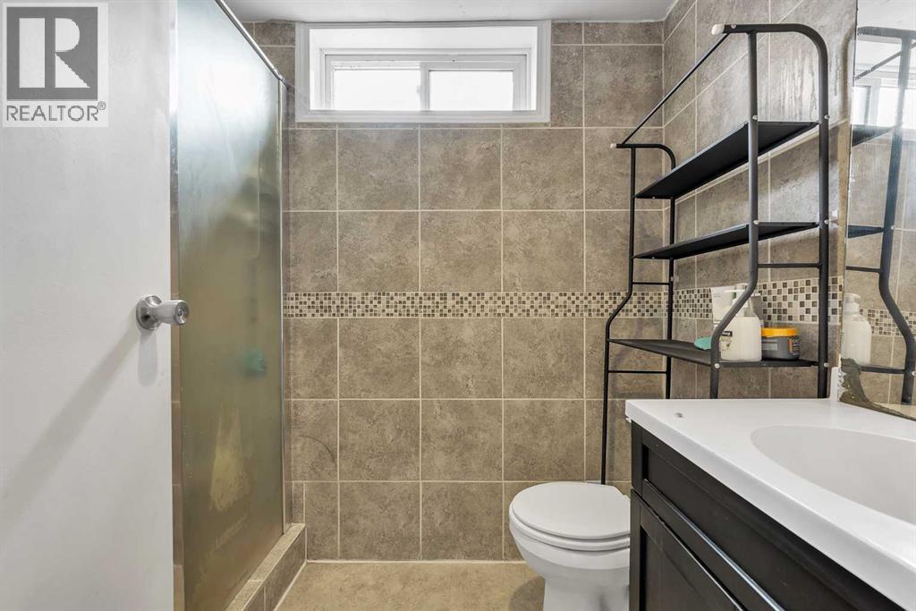 511 Woodpark Crescent SW, Calgary, Alberta  T2W 2S1 - Photo 35 - A2299796