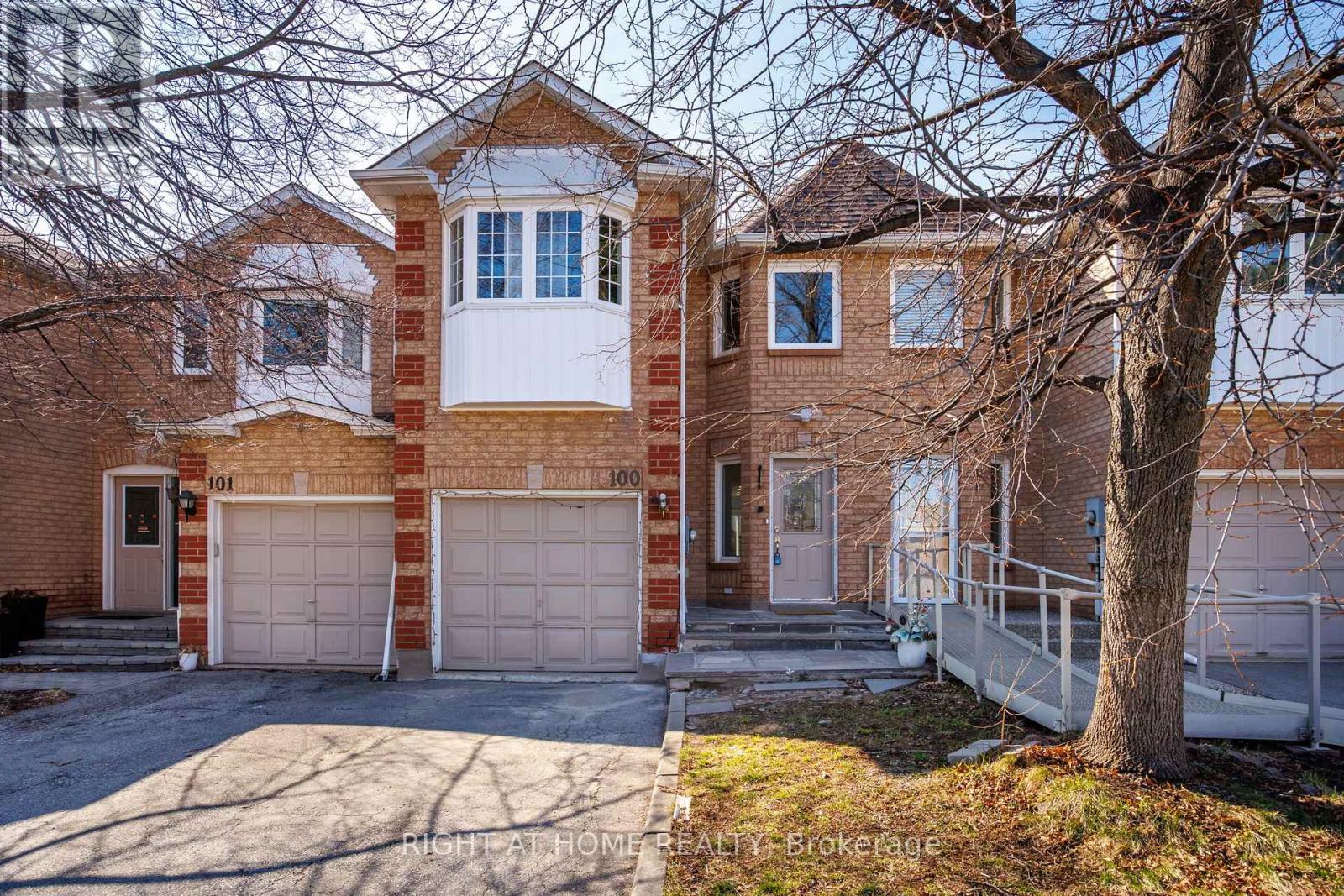 100 - 2350 Grand Ravine Drive, Oakville, Ontario  L6H 6E2 - Photo 2 - W12979314