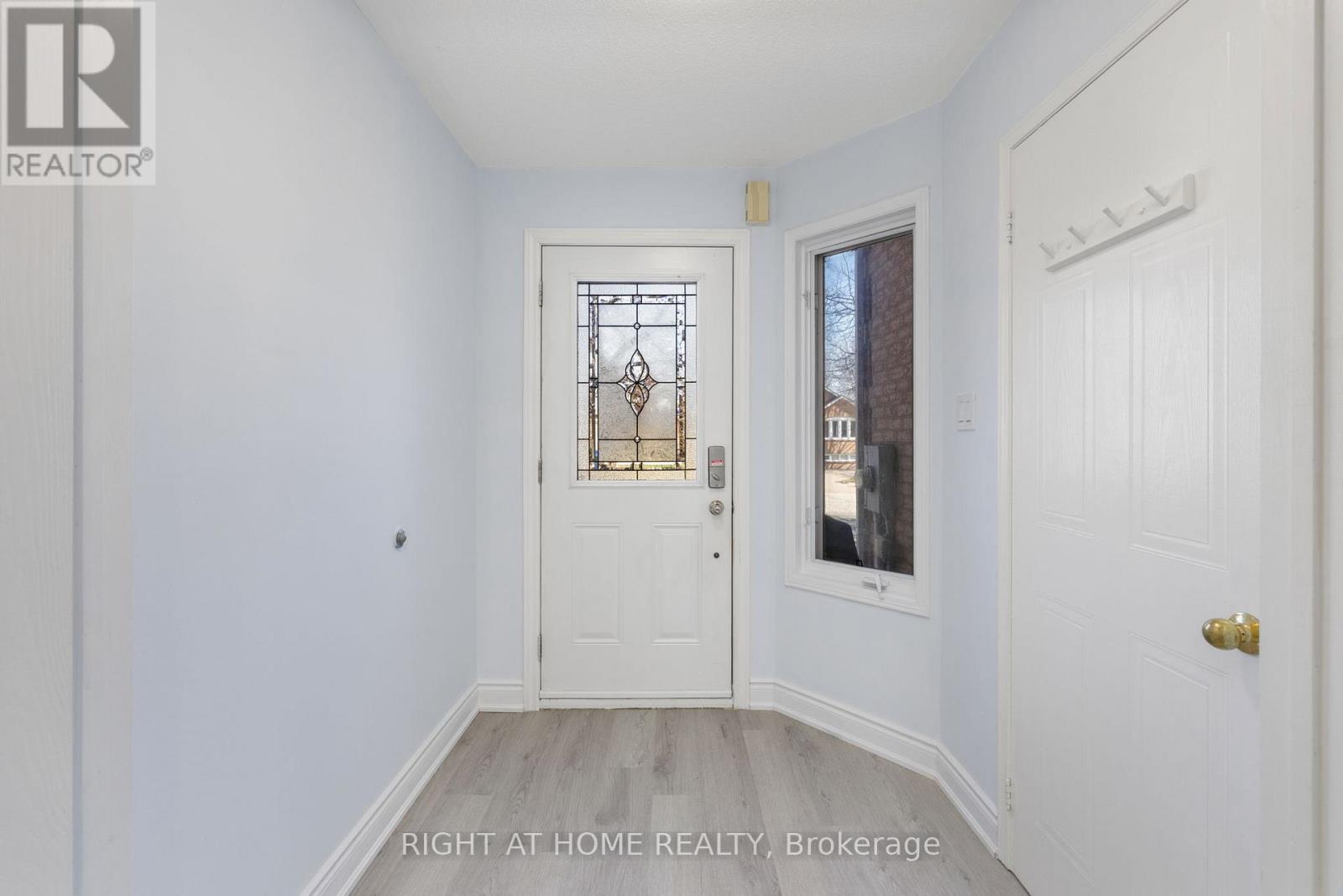 100 - 2350 Grand Ravine Drive, Oakville, Ontario  L6H 6E2 - Photo 3 - W12979314